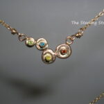 14K Yellow Gold Lilly Pad Necklace with 4 colored Diamonds