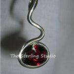 Sterling Studio Garnet Squiggle Pendant